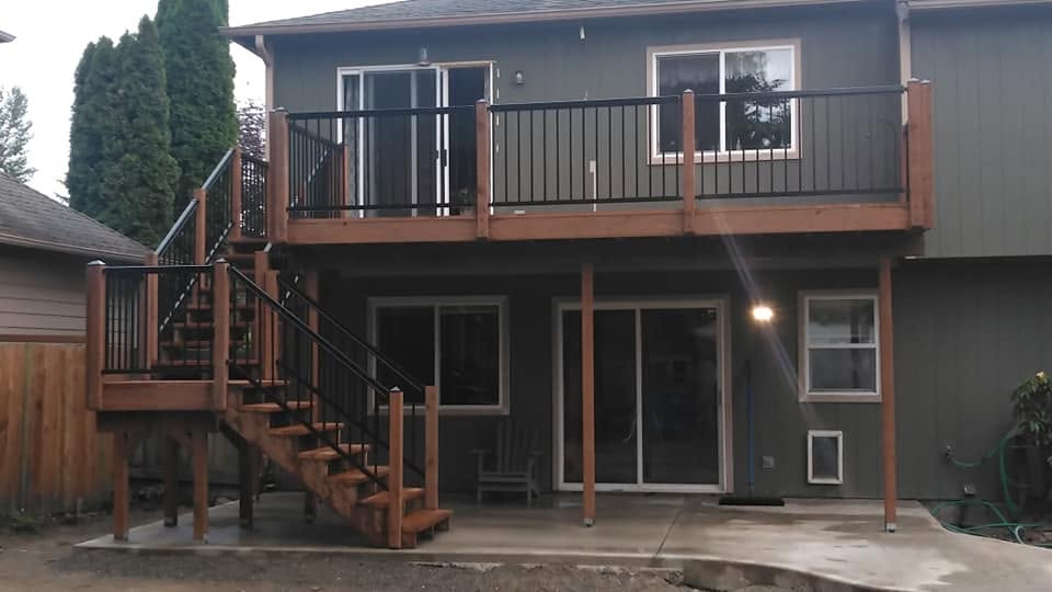 Completed deck and stair installation after the remodel