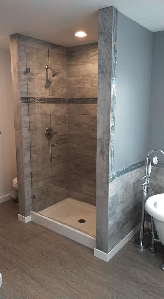Glass shower installation with tile surround