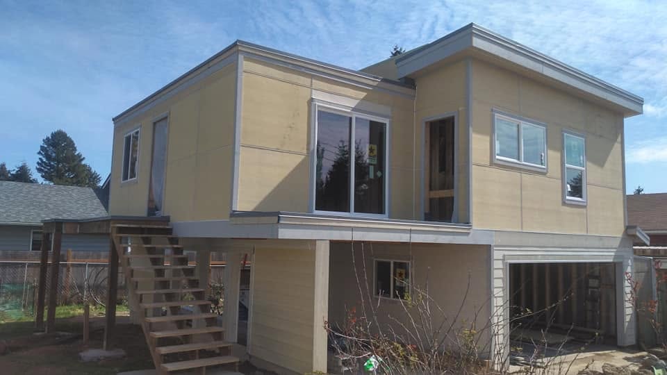 Modern home addition with elevated structure