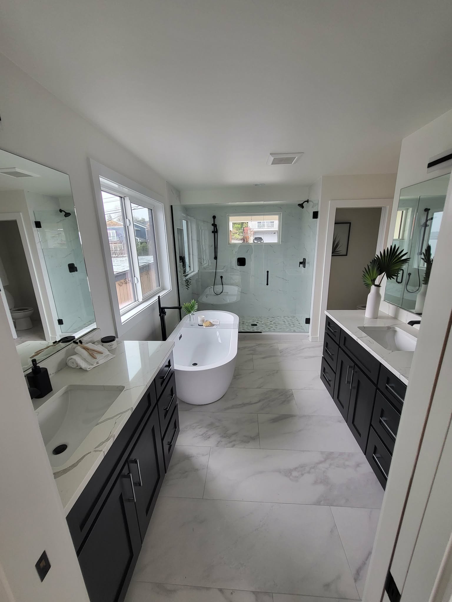 Luxury bathroom with soaking tub and glass shower